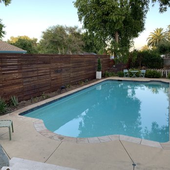 Fence Plus - Back fence, horizontal redwood with Penofin Mission Brown stain. - Fences & Gates Near Me - Vista, California