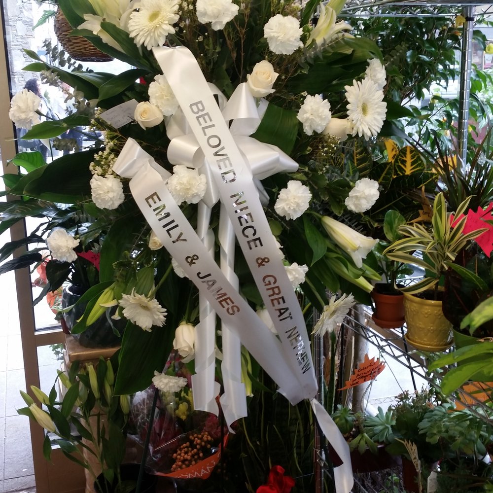 The flower arrangement made by Flowers by Lili. She was very helpful and quite pleasant. The flower arrangement made by Flowers by Lili. She was very helpful and quite pleasant.