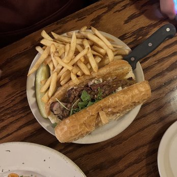 The White Horse Restaurant & Bar - Pork Tenderloin Sandwhich - Pubs Near Me - St. Cloud, Minnesota