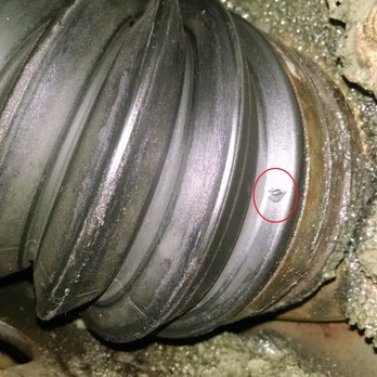 Tire Works - CV shaft boot with hole. Torn with grease all around. Thanks Superior Tire for causing this. - Tires Near Me - Kingman, Arizona Tire Works - CV shaft boot with hole. Torn with grease all around. Thanks Superior Tire for causing this. - Tires Near Me - Kingman, Arizona