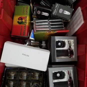 Sam's Supermarket - a red bin full of cameras - Food Near Me - Bakersfield, California