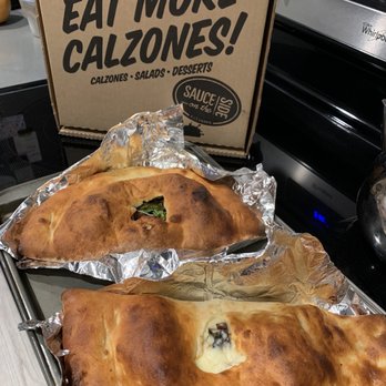 Sauce on the Side - Garden Calzone (top) & Costanza calzone (bottom) - Italian Near Me - Carmel, Indiana