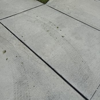 Blue Bell Landscaping - They leave tire marks and grass stains on driveway, sidewalk and up personal walkway. - Landscaping Near Me - Merritt Island, Florida