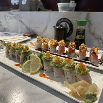 Sushi Miyazawa - 65. Hamachi (Yellowtail) w/ Miyabi topping abd 51. Christmas Roll DELICIOUS - Japanese Near Me - Worcester, Massachusetts