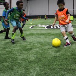Euro Soccer USA - Dallas - Plenty of grass in the indoor facility to let the kids run around and play.
