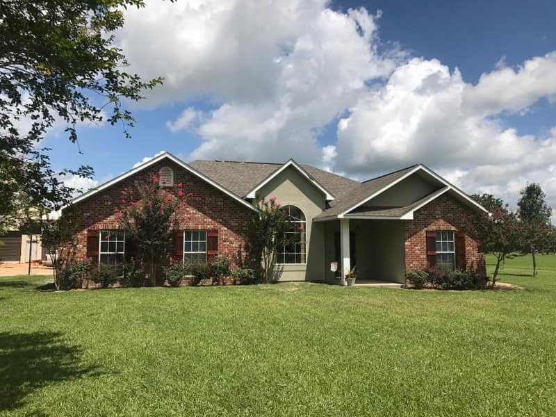Slide of John Theriots Roofing