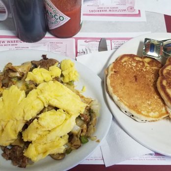 Six Mile Cafe - Farmers scramble with cakes. - American Near Me - Lagrange, Indiana