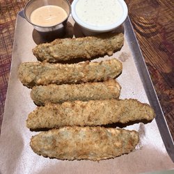 Country Tavern Barbecue - Fried pickles perfectly done! My favorite place to get them. Comes with ranch and remoulade