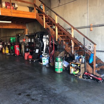 V-Tech Automotive - Boat motor on the side wall is interesting - Auto Repair Near Me - Fairfield, California V-Tech Automotive - Boat motor on the side wall is interesting - Auto Repair Near Me - Fairfield, California