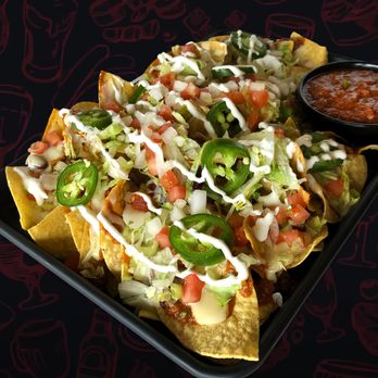Wings Etc - a plate of nachos with sauce - Sports Bars Near Me - Kendallville, Indiana Wings Etc - a plate of nachos with sauce - Sports Bars Near Me - Kendallville, Indiana