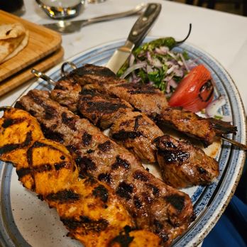 L'Olive - a plate of grilled meat and vegetables - Mediterranean Near Me - Venice, Florida L'Olive - a plate of grilled meat and vegetables - Mediterranean Near Me - Venice, Florida