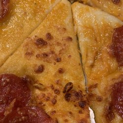 Little Caesar's Pizza - No cheese, that's literally dough with cheese sauce on it!