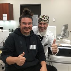 Katzen Eye Care & Laser Center - Dr. Luchs with a happy LASIK patient.