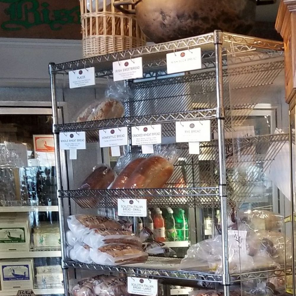 DiCamillo Bakery - My favorite bread and sample on this rack at back of store or off side parking lot Entrance~ - Bakeries Near Me - Williamsville, New York