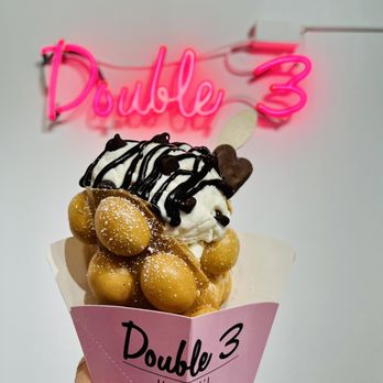 Double Three - Original Bubble Waffle with vanilla ice cream with chocolate chips / peanut butter wafer and chocolate sauce . - Ice Cream & Frozen Yogurt Near Me - Kailua, Hawaii Double Three - Original Bubble Waffle with vanilla ice cream with chocolate chips / peanut butter wafer and chocolate sauce . - Ice Cream & Frozen Yogurt Near Me - Kailua, Hawaii