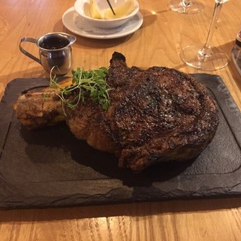 Clintons Bar & Grille - Perfectly cooked bone in mamouth rib eye. - New American Near Me - Clinton, Massachusetts Clintons Bar & Grille - Perfectly cooked bone in mamouth rib eye. - New American Near Me - Clinton, Massachusetts