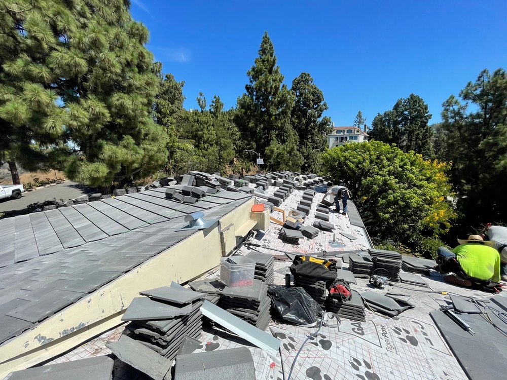 Slide of United Frontier Roofing