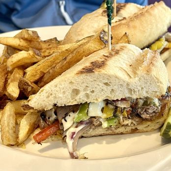 Group Therapy Bar And Grill - Philly cheesesteak with garlic fries - Sports Bars Near Me - Renton, Washington Group Therapy Bar And Grill - Philly cheesesteak with garlic fries - Sports Bars Near Me - Renton, Washington