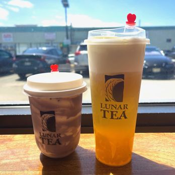 Lunar Tea - purple rice yogurt (left) & peach tea milk cap (right) - Coffee & Tea Near Me - Honolulu, Hawaii Lunar Tea - purple rice yogurt (left) & peach tea milk cap (right) - Coffee & Tea Near Me - Honolulu, Hawaii