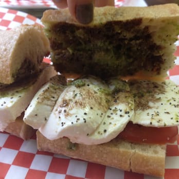Elena's Cucina - Inside the caprese sandwich on a fresh baguette - Delis Near Me - Roselle, Illinois Elena's Cucina - Inside the caprese sandwich on a fresh baguette - Delis Near Me - Roselle, Illinois