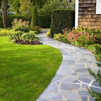 K&O Landscaping - a stone path in a garden - Landscaping Near Me K&O Landscaping - a stone path in a garden - Landscaping Near Me