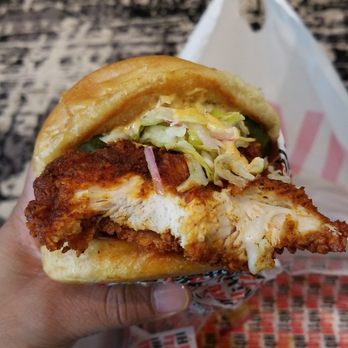 Howlin' Ray's - Chicken was so big i didnt even get to the bread or slaw yet. Hahah - Southern Near Me - Los Angeles, California