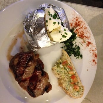 Buenos Aires - 200g sirloin steak, with baked potato and partially eaten bread :$ :)! - Steakhouses Near Me - Barcelona, B