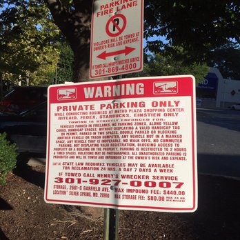 Henry's Wrecker Service - The sign that clearly states what stores we are able to visit ( the same sign the employees don't even know) - Towing Near Me - Silver Spring, Maryland