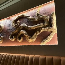 Social - Artwork that evokes the simple earthly elegance of the place.