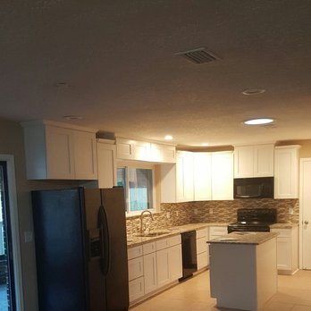 Kevin's Kitchen & Baths - a view of the kitchen from the living room - Countertop Installation Near Me