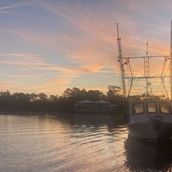 Crystal River Boat Tours - Shrimp trawler at daybreak on Kings Bay in Crystal River