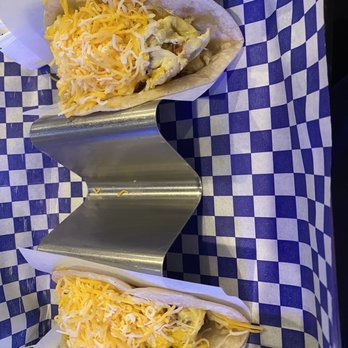 Memorial Tacos - One potato egg, and cheese tacos and one bacon, egg and cheese - Tacos Near Me - Houston, Texas Memorial Tacos - One potato egg, and cheese tacos and one bacon, egg and cheese - Tacos Near Me - Houston, Texas