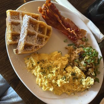 Eggstravaganza Cafe - (American breakfast from the menu)  2 eggs scrambled, bacon, hash browns, & waffles. - Breakfast & Brunch Near Me - Antioch, Tennessee