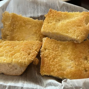 Petrella's Italian Cafe - Toasted Garlic Bread-served with lunch - Italian Near Me - Pensacola, Florida Petrella's Italian Cafe - Toasted Garlic Bread-served with lunch - Italian Near Me - Pensacola, Florida