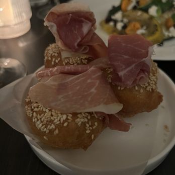 Ilo Bistro - Savory Loukomades Shaved surryano ham, honey, sesame - French Near Me - Norfolk, Virginia