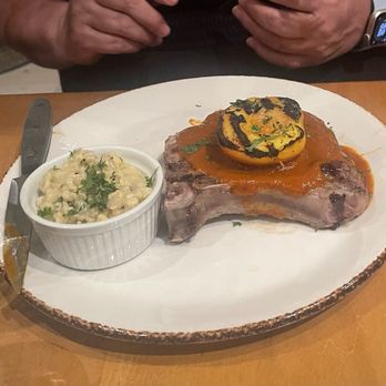Duo Restaurant - Pork chop w/grilled peach and Pueblo creamed corn - New American Near Me - Denver, Colorado