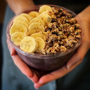 Arlee's Raw Blends - a person holding a bowl of fruit - Acai Bowls Near Me - Trenton, New Jersey