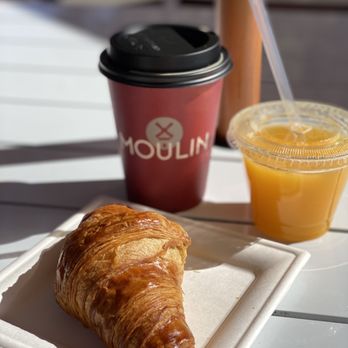 Moulin - a croissant and a cup of orange juice - Cafes Near Me - Laguna Beach, California