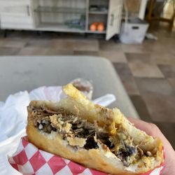 El Arepaso Venezuelan Cafe - Several bites into arepa