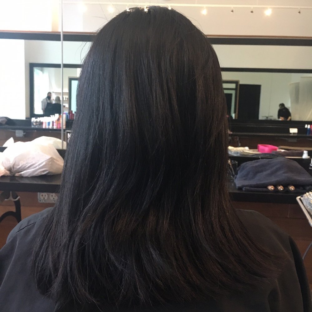 Dark brown colored hair. Dark brown colored hair.