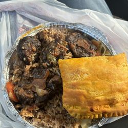 Tropics Island Grill - Oxtail, rice and beans, cabbage, & beef patty.