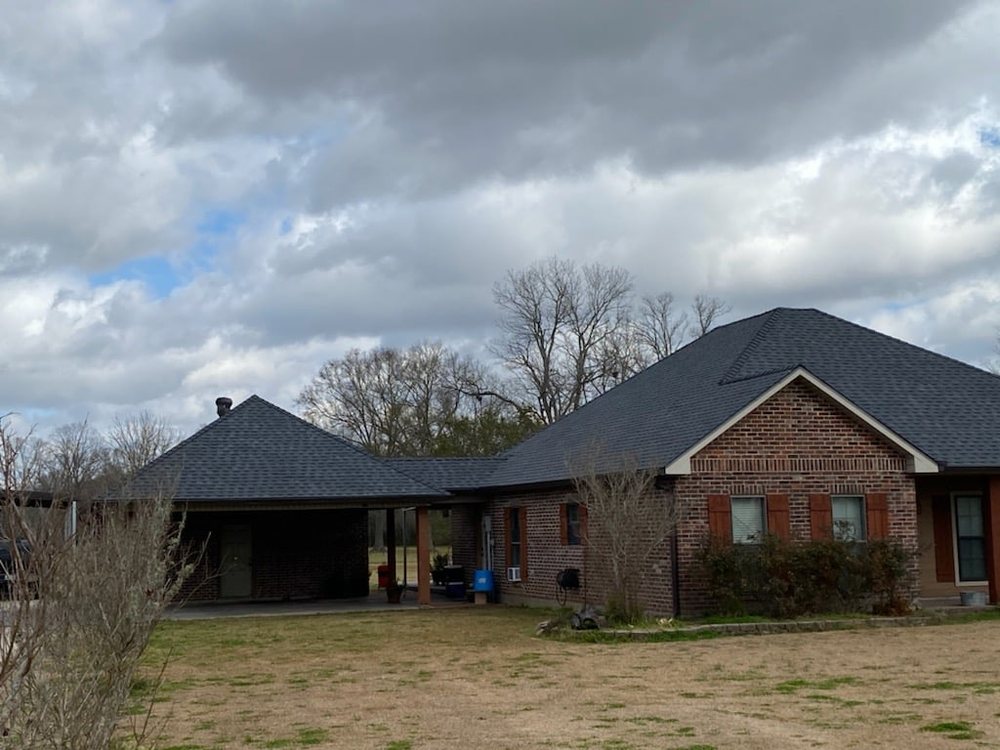 Slide of John Theriots Roofing