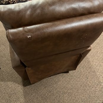 Two Men and A Truck - Ripped leather recliner. - Movers Near Me - Gurnee, Illinois