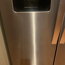 Even with constant wiping, the fridge leak has ruined the front.