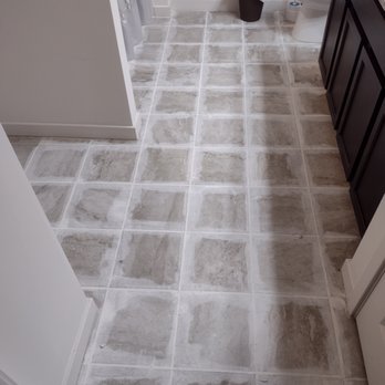 Sharpers 1st - a tile floor in a bathroom - General Contractors Near Me