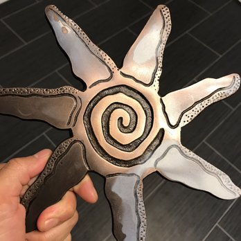 Tobin James Cellars - Apparently this trivet (hot pot holder) shouldn't be used to hold hot pots..... - Wineries Near Me - Paso Robles, California Tobin James Cellars - Apparently this trivet (hot pot holder) shouldn't be used to hold hot pots..... - Wineries Near Me - Paso Robles, California