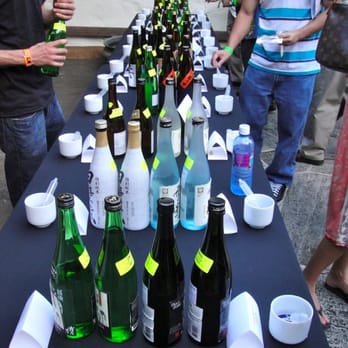 The Joy of Sake - one of the many many tables lined with sake - Festivals Near Me - Honolulu, Hawaii