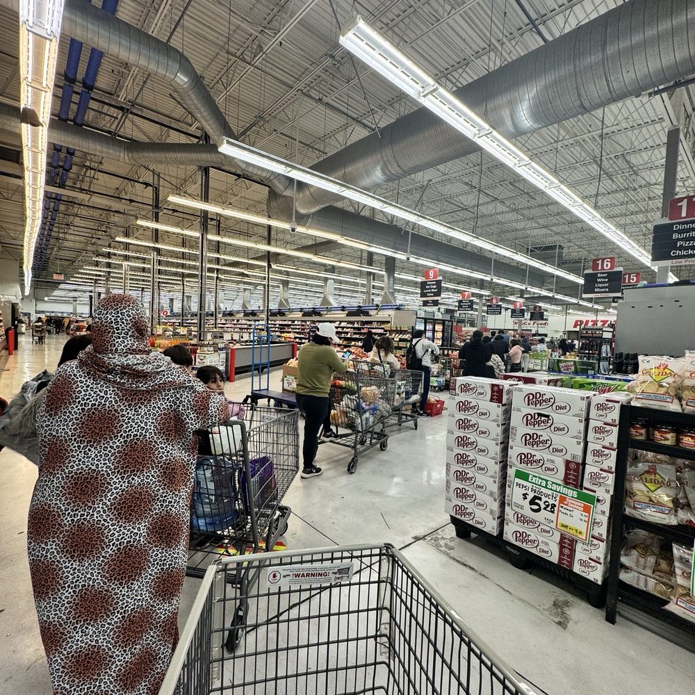 1 line to only TWO Registers open, leading all the way to the BACK OF THE STORE. Terrible staffing/management 1 line to only TWO Registers open, leading all the way to the BACK OF THE STORE. Terrible staffing/management