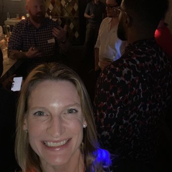 Upper Kirby Bistro - Selfie on one side of the L-shaped bar with colleagues behind me - New American Near Me - Houston, Texas Upper Kirby Bistro - Selfie on one side of the L-shaped bar with colleagues behind me - New American Near Me - Houston, Texas
