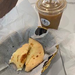 Cream cheese on gluten free cheese bread with lavender latte Cream cheese on gluten free cheese bread with lavender latte